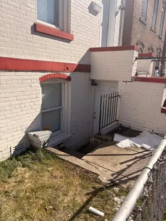 a view of a backyard of a house