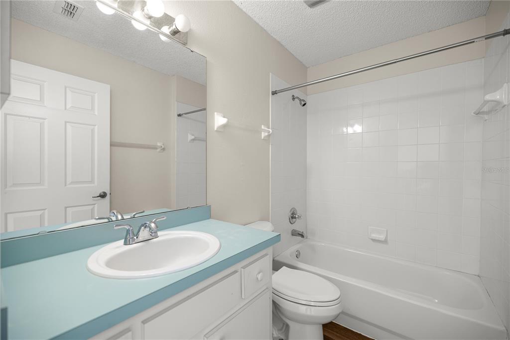 8478 Southwest 61st Terrace Road Ocala, FL 34476 - Photo 30 of 39 a bathroom with a sink toilet tub and shower