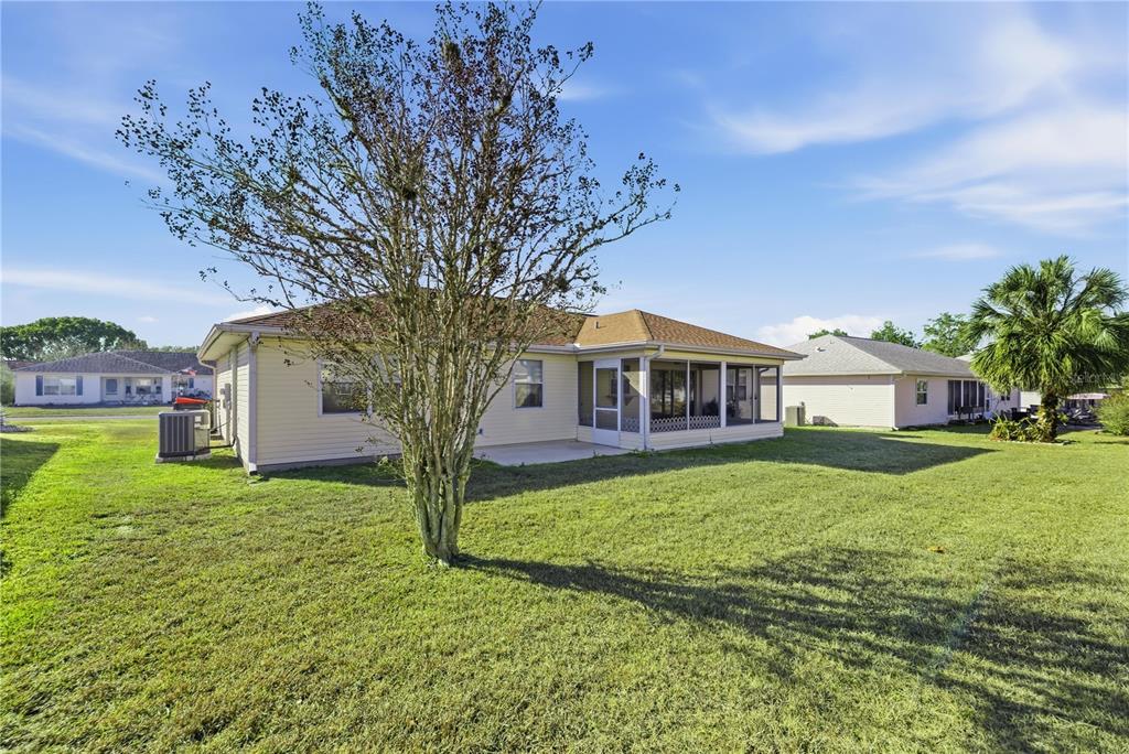8478 Southwest 61st Terrace Road Ocala, FL 34476 - Photo 37 of 39 a front view of a house with garden