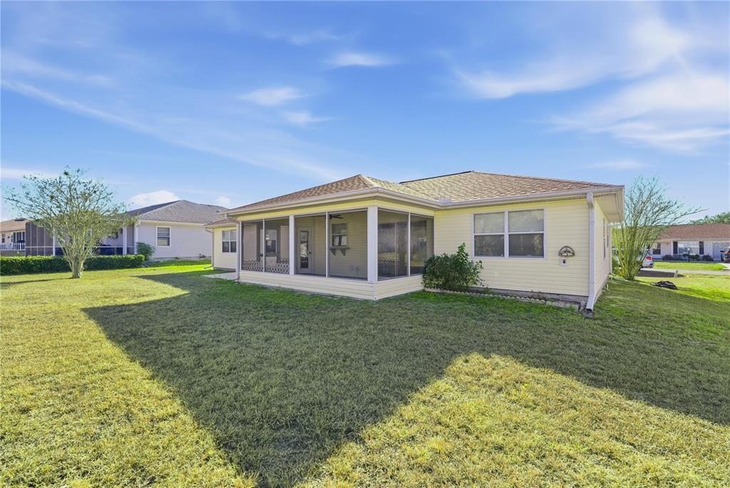 8478 Southwest 61st Terrace Road Ocala, FL 34476 - Photo 39 of 39 a view of a house with a yard