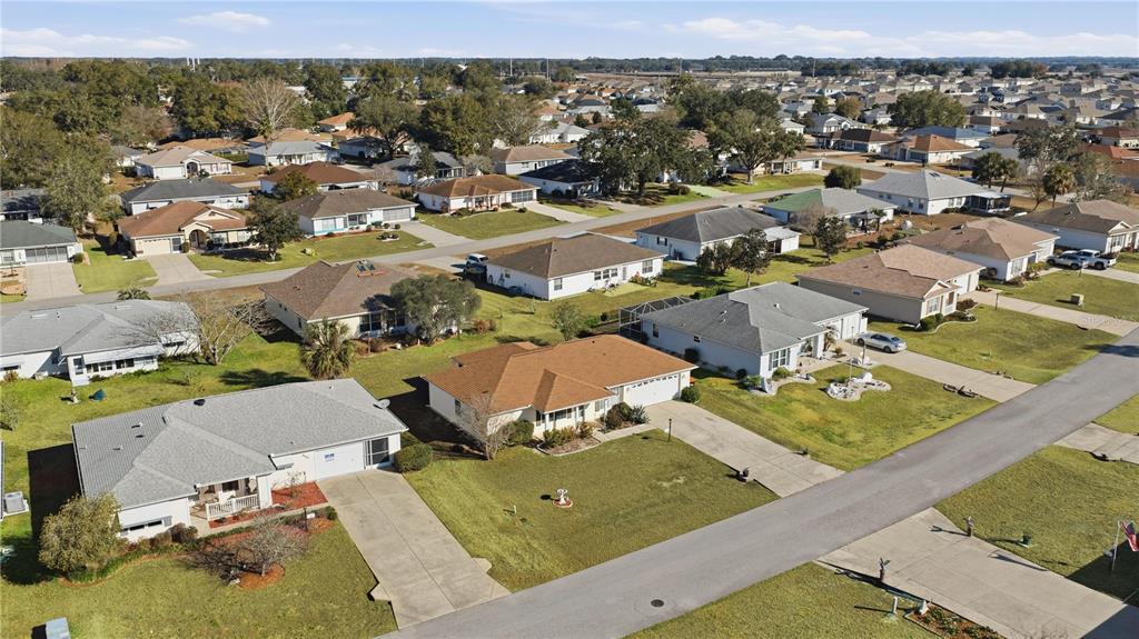8478 Southwest 61st Terrace Road Ocala, FL 34476 - Photo 9 of 39 an aerial view of residential houses with outdoor space