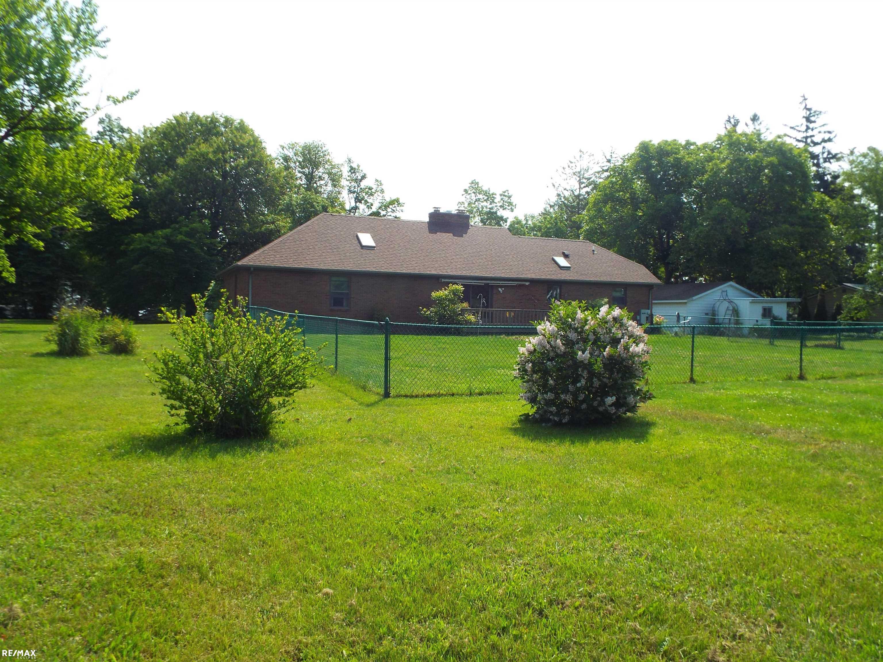 2299 North Lakeshore Road Carsonville, MI 48419 - Photo 24 of 31 Partical fence yard