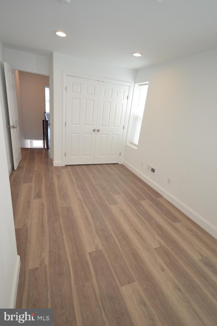 1827 Dudley Street Philadelphia, PA 19145 - Photo 8 of 15 a view of an empty room and a window