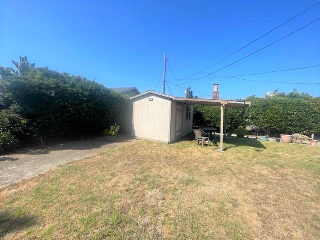 504 Harding Circle Salinas, CA 93906 - Photo 13 of 16 a backyard of a house with a yard and garage