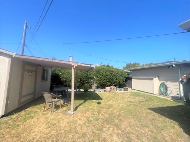 504 Harding Circle Salinas, CA 93906 - Photo 14 of 16 a view of a chair and tables in the patio