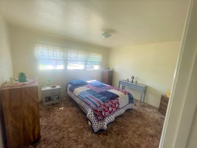 504 Harding Circle Salinas, CA 93906 - Photo 8 of 16 a bedroom with a bed and window