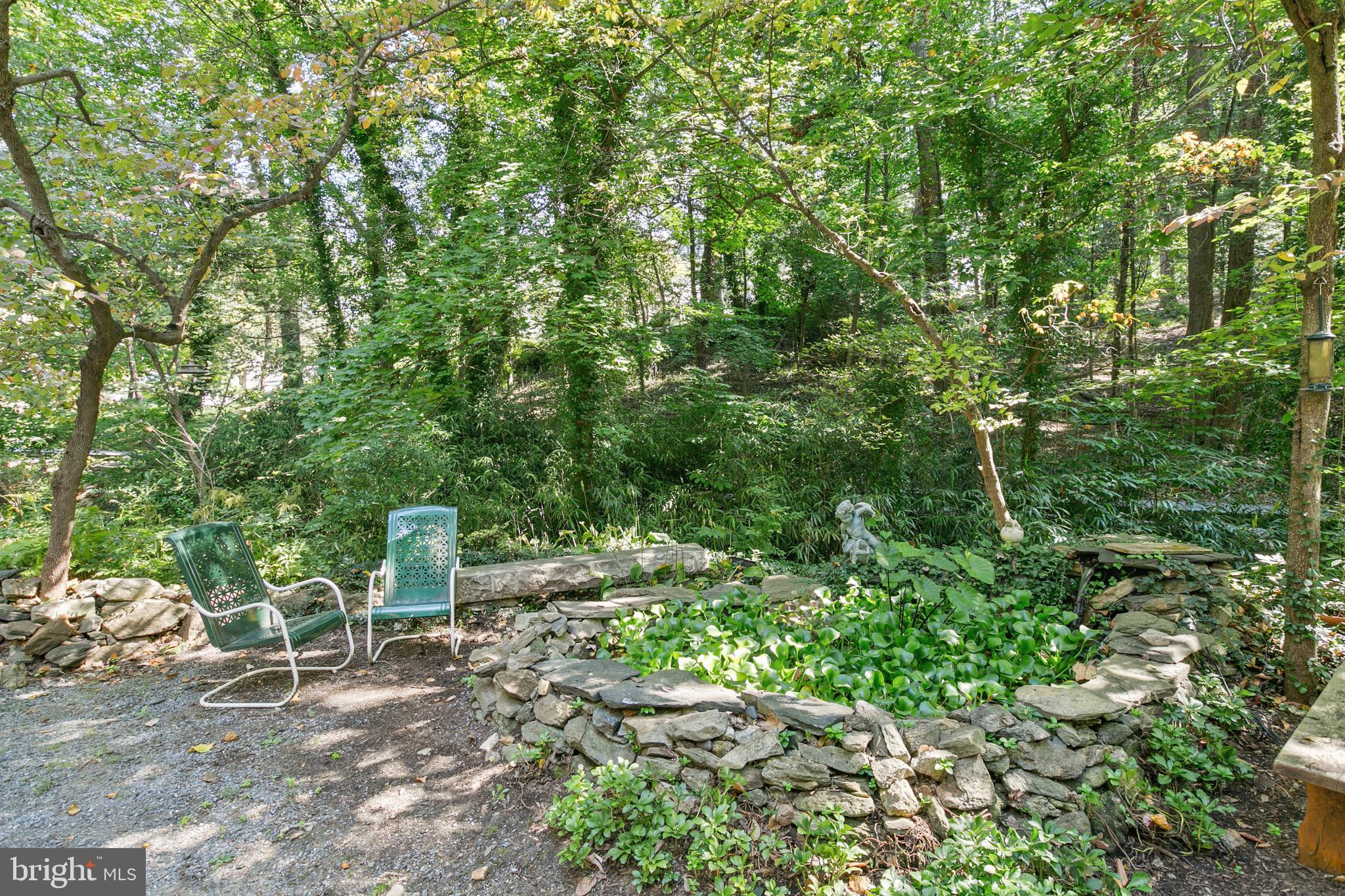 900 Navy Road Towson, MD 21204 - Photo 69 of 78 Stacked Stone Lily Pond in front of house.