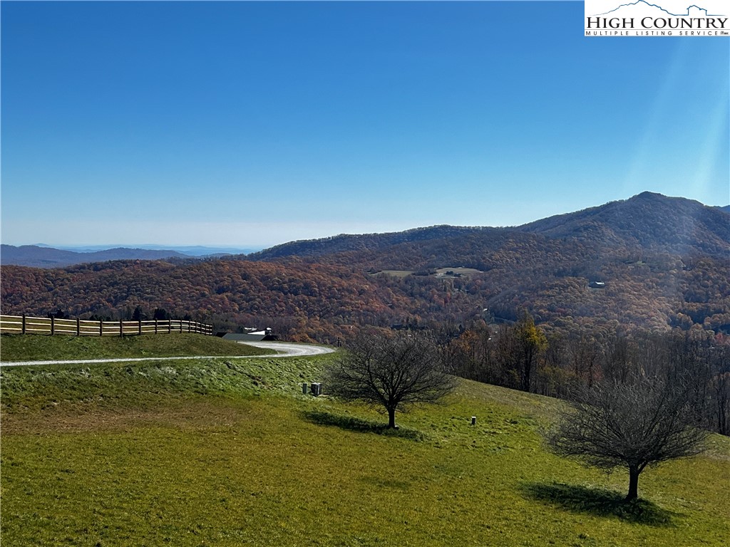 Site C Chappell Farm Road Banner Elk, NC 28604 - Photo 15 of 41 a view of a lake with a mountain in the background