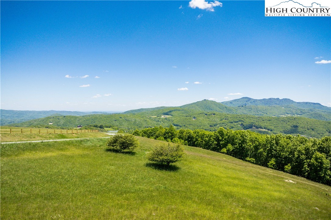Site C Chappell Farm Road Banner Elk, NC 28604 - Photo 24 of 41 a view of a lake with a mountain