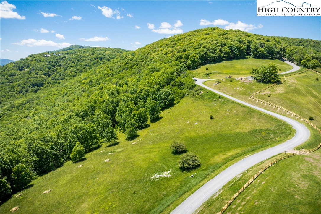 Site C Chappell Farm Road Banner Elk, NC 28604 - Photo 30 of 41 a view of a swimming pool with a yard