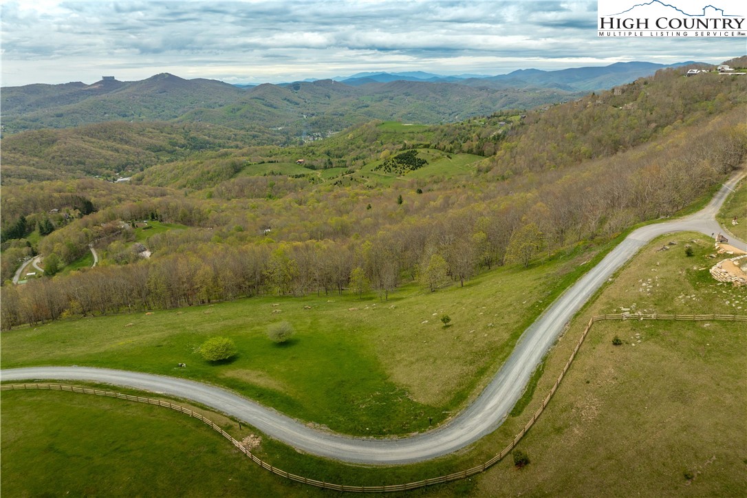Site C Chappell Farm Road Banner Elk, NC 28604 - Photo 39 of 41 a view of a swimming pool with a yard