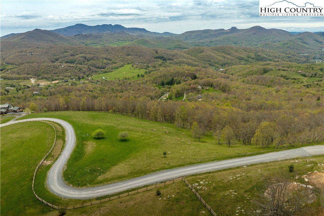 Site C Chappell Farm Road Banner Elk, NC 28604 - Photo 6 of 41 a view of a swimming pool with a yard