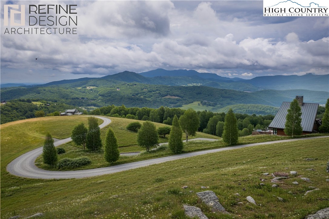 Site C Chappell Farm Road Banner Elk, NC 28604 - Photo 7 of 41 a view of a lake with a mountain in the background