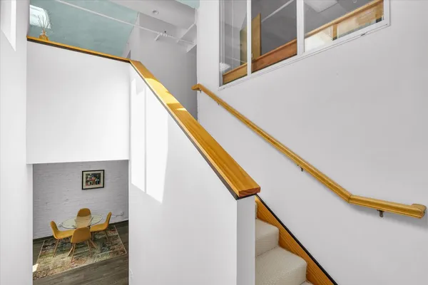 a view of balcony and wooden floor