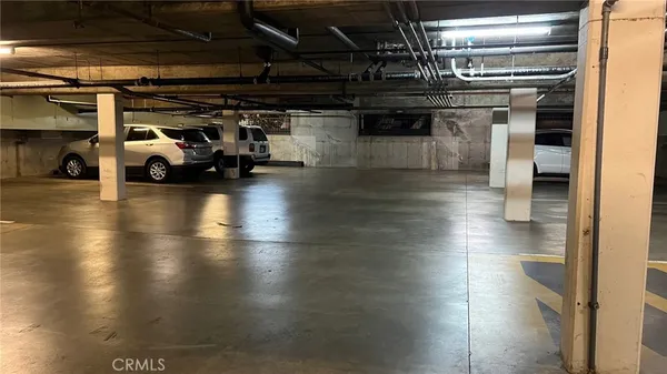 a view of hallway with wooden floor