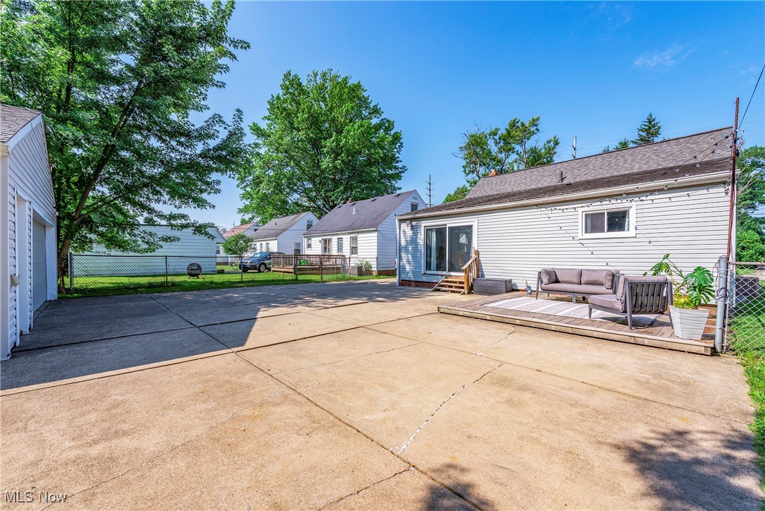 1605 Lander Road Cleveland, OH 44124 - Photo 37 of 38 Rear view of property featuring a patio, outdoor lounge area, a deck, and entry steps