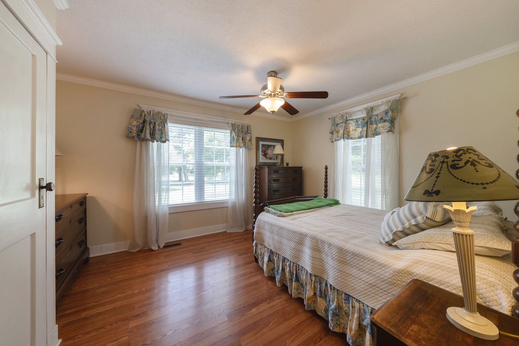 2446 Warner Bridge Road Shelbyville, TN 37160 - Photo 18 of 42 a bedroom with a bed and wooden floor