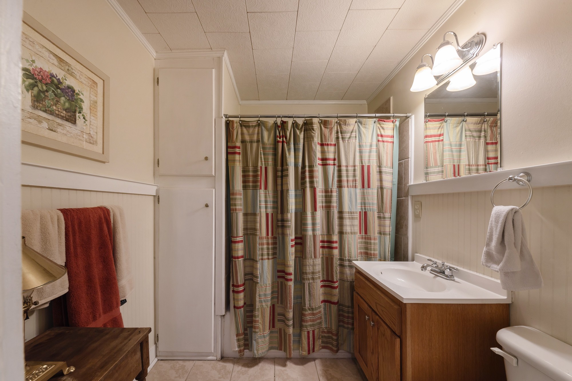 2446 Warner Bridge Road Shelbyville, TN 37160 - Photo 20 of 42 a bathroom with a sink a toilet and a mirror