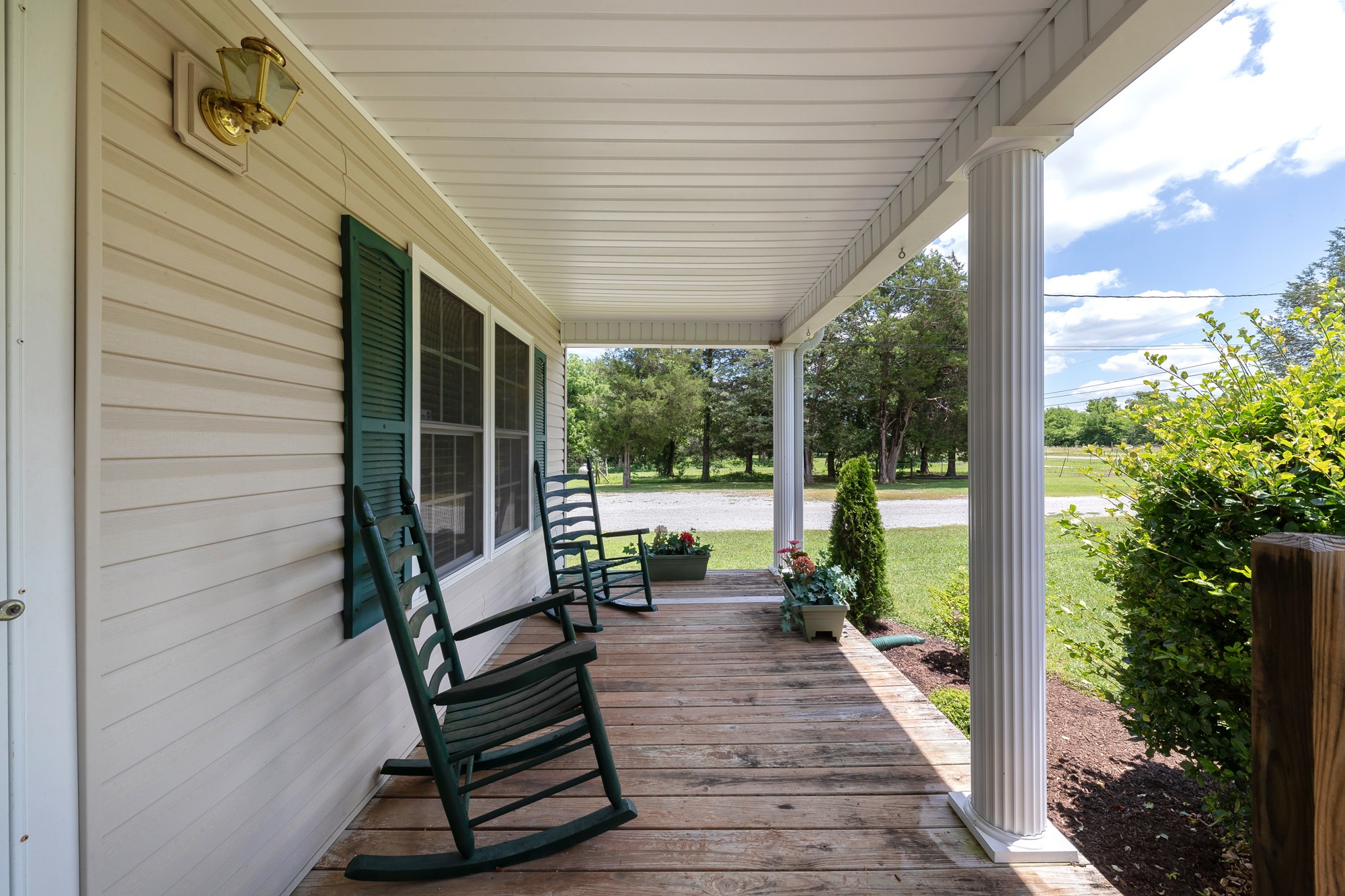 2446 Warner Bridge Road Shelbyville, TN 37160 - Photo 4 of 42 a view of a two chairs in the balcony