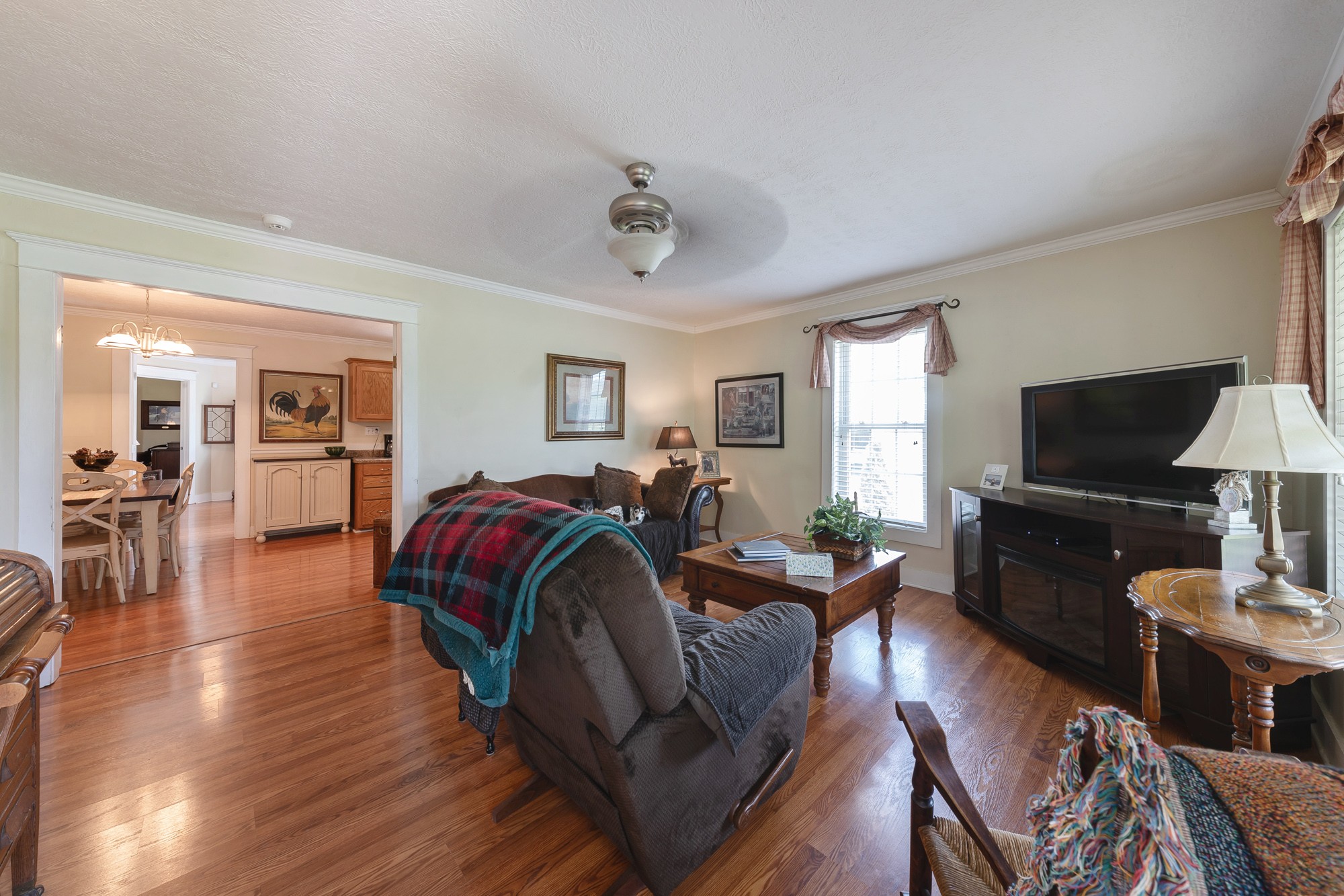 2446 Warner Bridge Road Shelbyville, TN 37160 - Photo 5 of 42 a living room with furniture flat screen tv and wooden floor