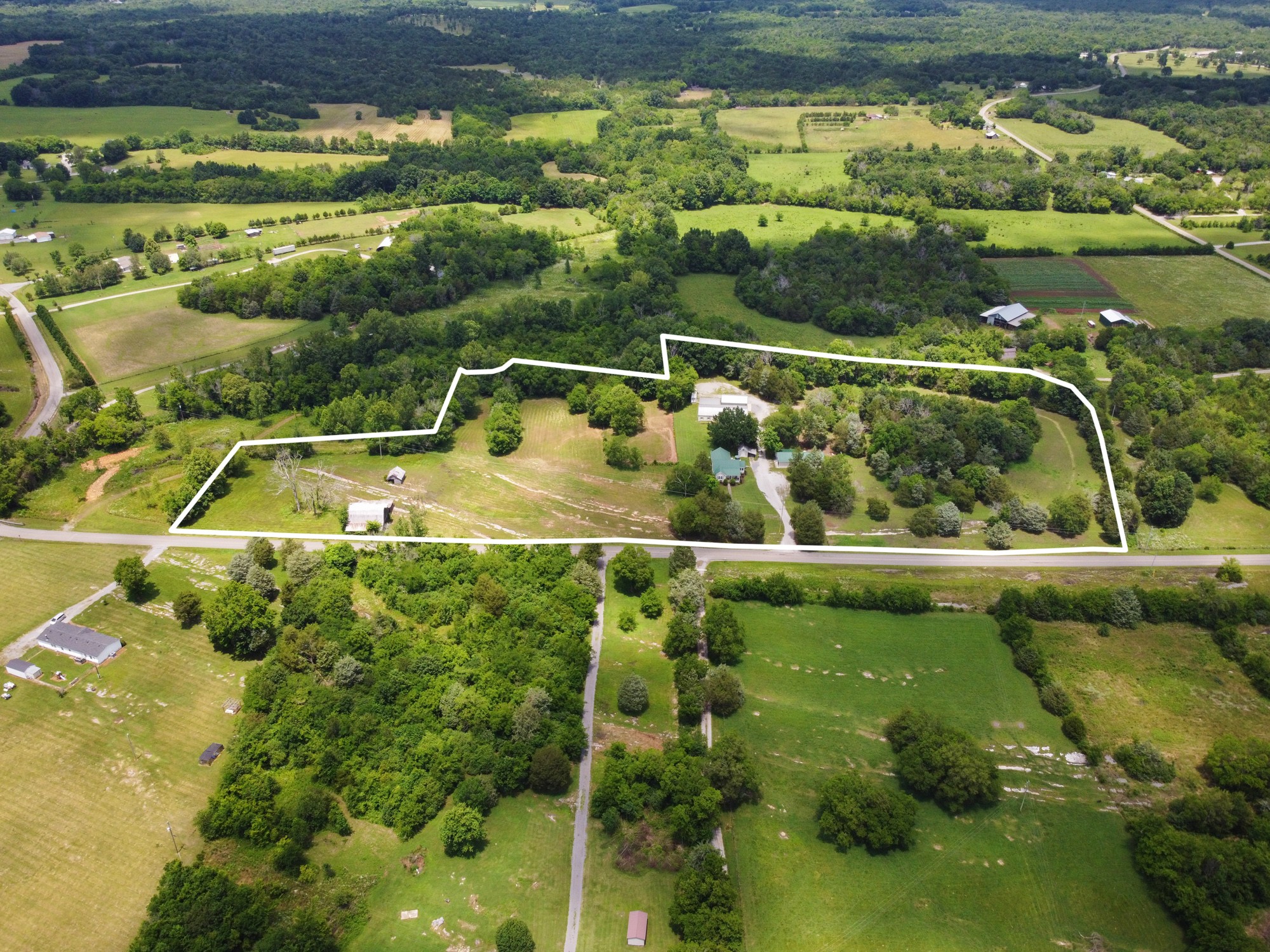2446 Warner Bridge Road Shelbyville, TN 37160 - Photo 42 of 42 a view of a swimming pool with a yard