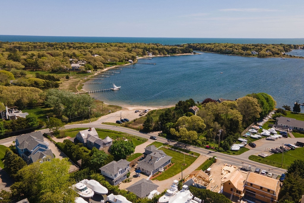 an aerial view of a house with a lake view
