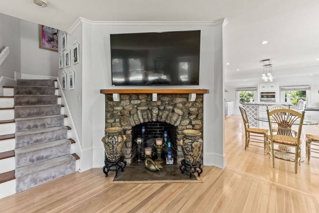 88 Bridge Street Barnstable, MA 02655 - Photo 16 of 36 a living room with furniture and a fireplace