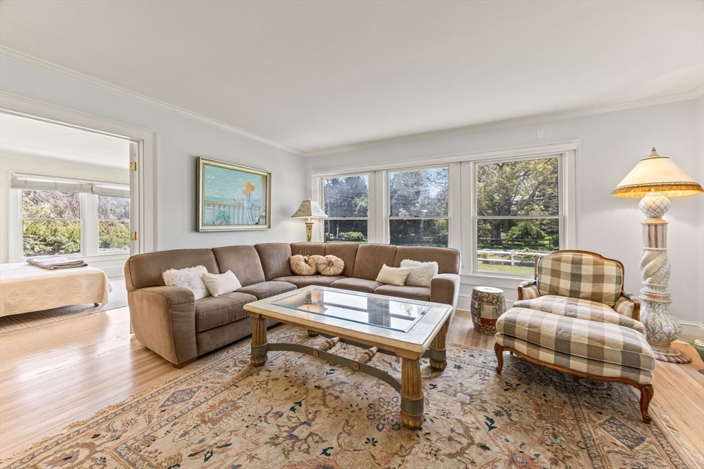 88 Bridge Street Barnstable, MA 02655 - Photo 18 of 36 a living room with furniture and a large window