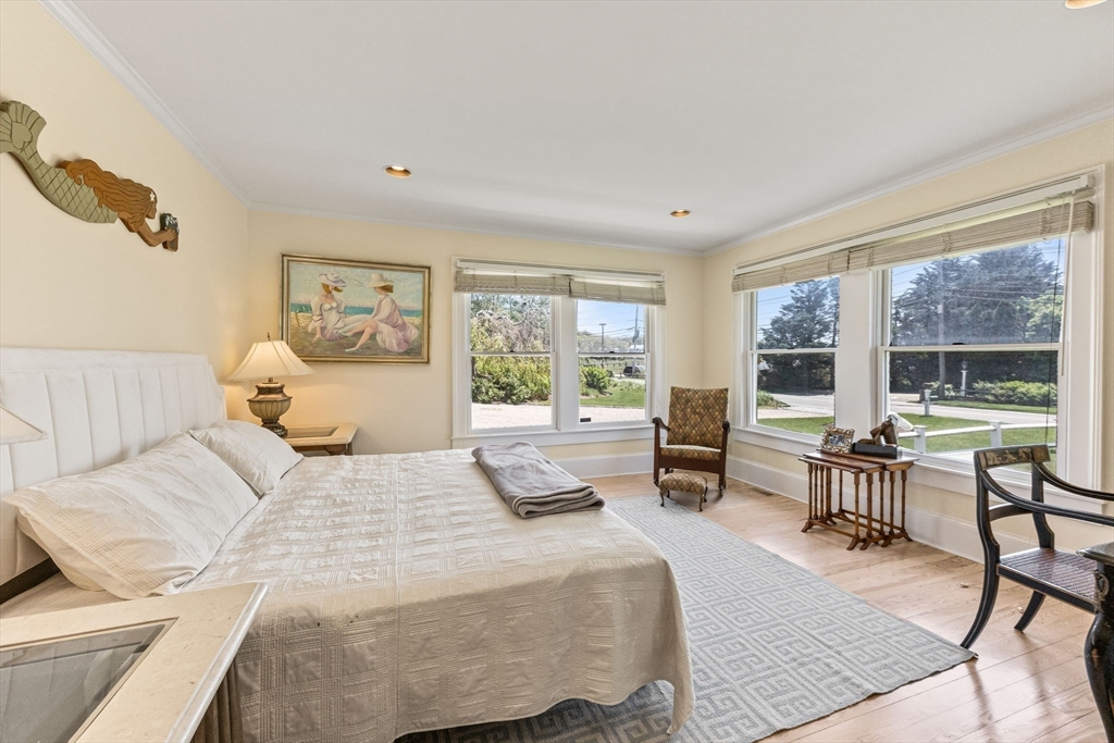 88 Bridge Street Barnstable, MA 02655 - Photo 20 of 36 a bedroom with a bed and a large window