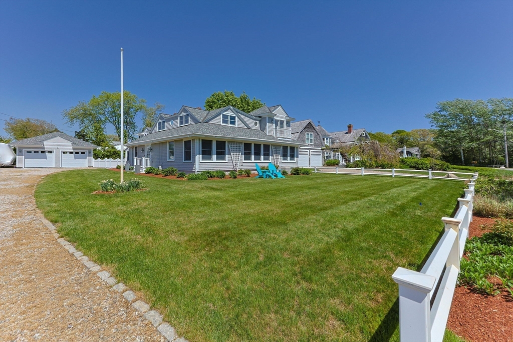 88 Bridge Street Barnstable, MA 02655 - Photo 2 of 36 a view of a house with a yard