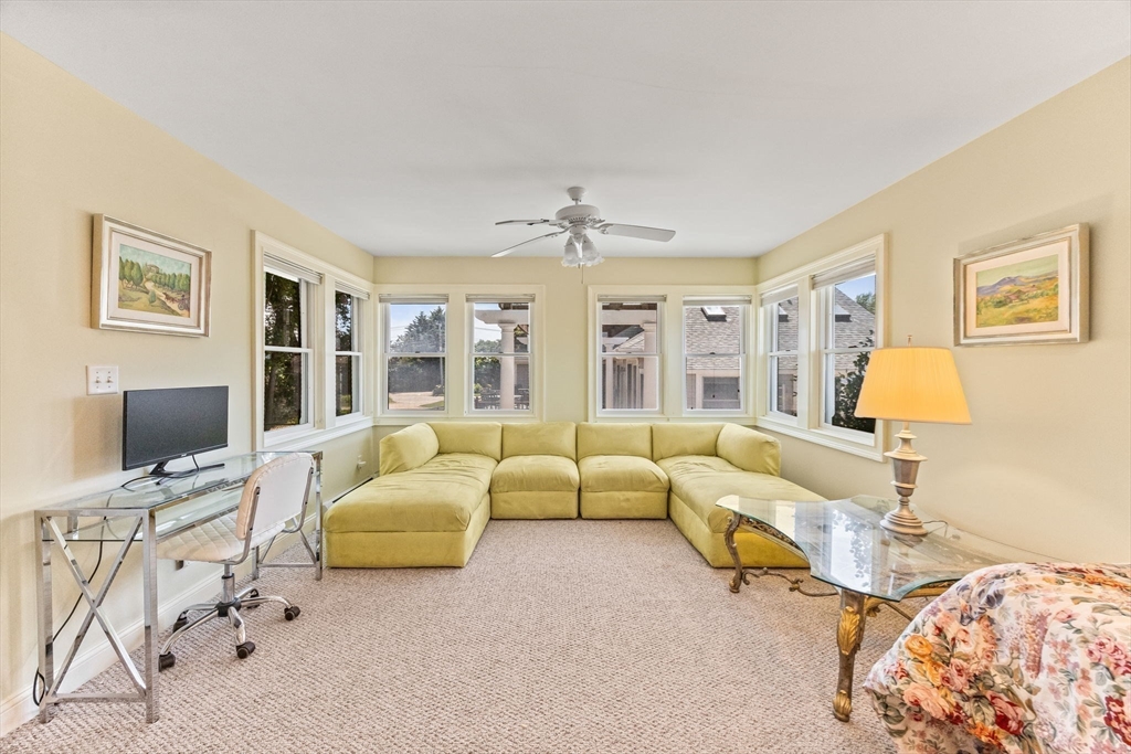88 Bridge Street Barnstable, MA 02655 - Photo 28 of 36 a living room with furniture and a flat screen tv