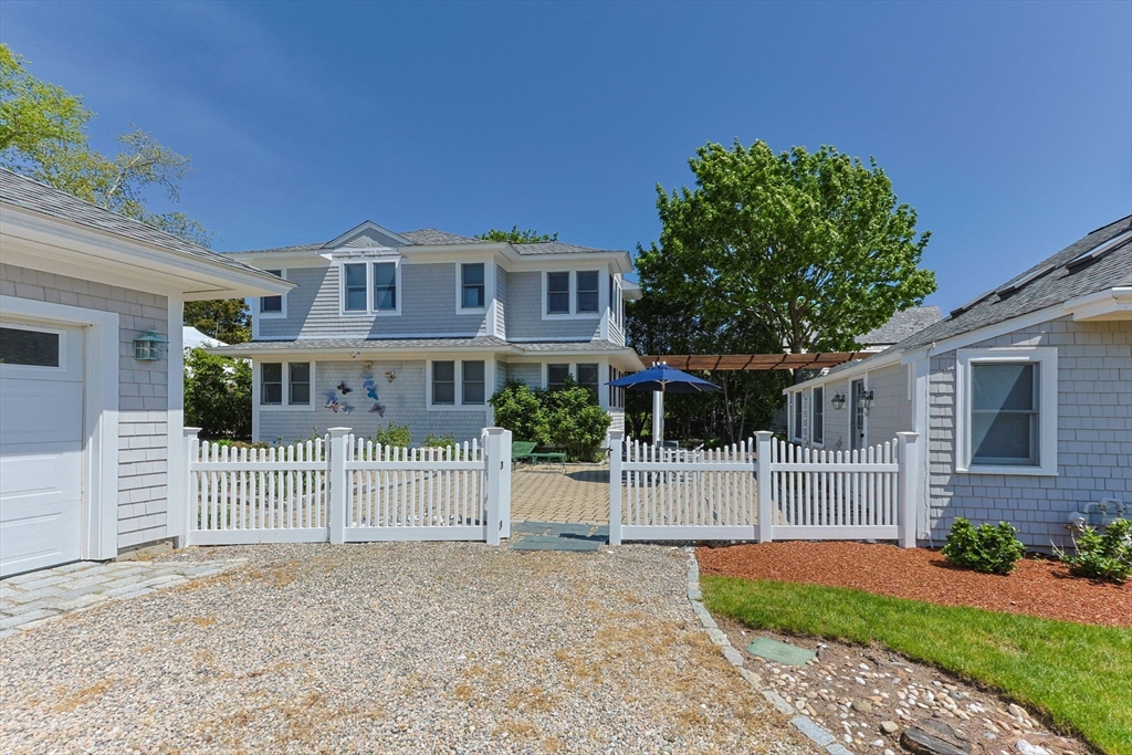 88 Bridge Street Barnstable, MA 02655 - Photo 4 of 36 front view of a house with a small yard