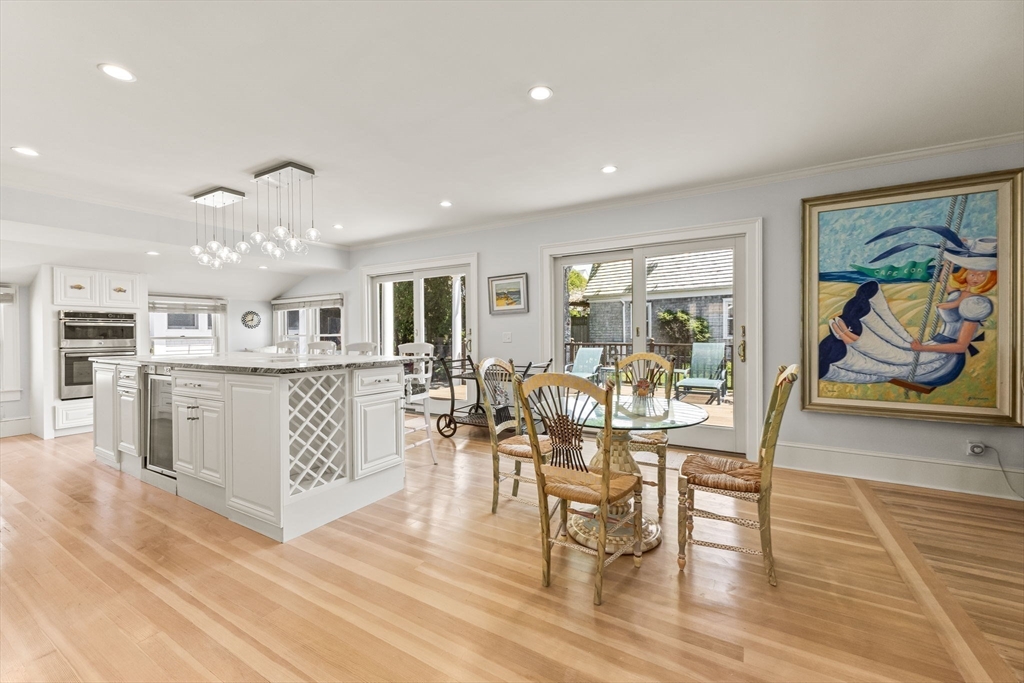 88 Bridge Street Barnstable, MA 02655 - Photo 10 of 36 a view of a dining room with furniture and wooden floor