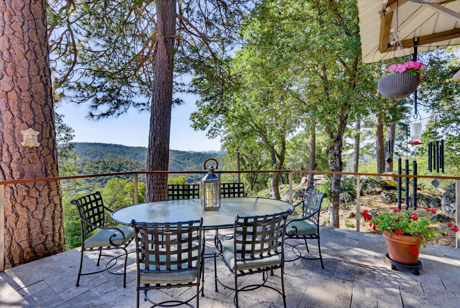 20111 Tanglewood Road Grass Valley, CA 95945 - Photo 50 of 93 a view of a chairs and table in the balcony
