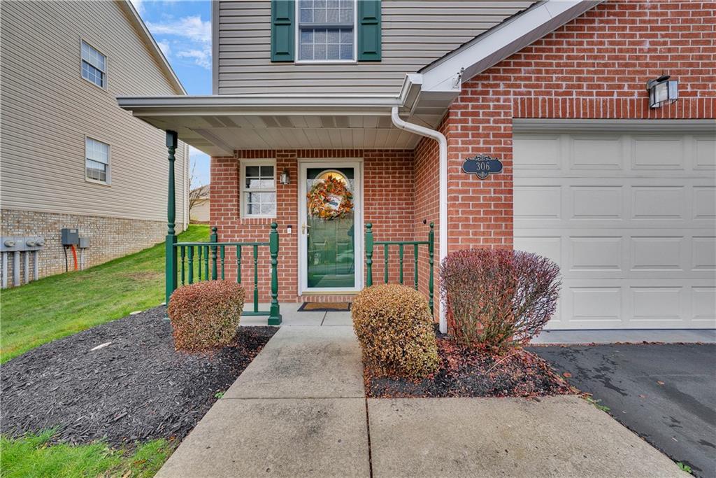 306 Acre Avenue Butler, PA 16001 - Photo 2 of 29 a front view of a house with garden