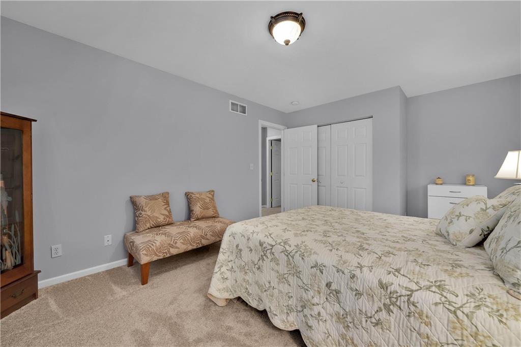 306 Acre Avenue Butler, PA 16001 - Photo 23 of 29 a bedroom with a bed and a couch