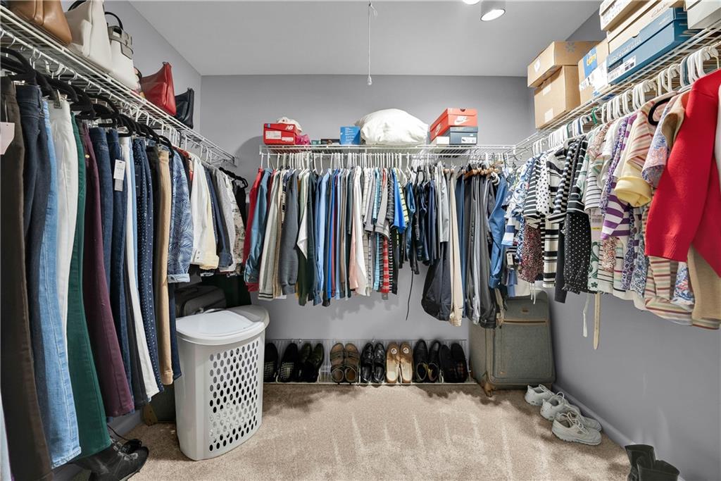 306 Acre Avenue Butler, PA 16001 - Photo 27 of 29 a view of walk in closet with clothes and shoes