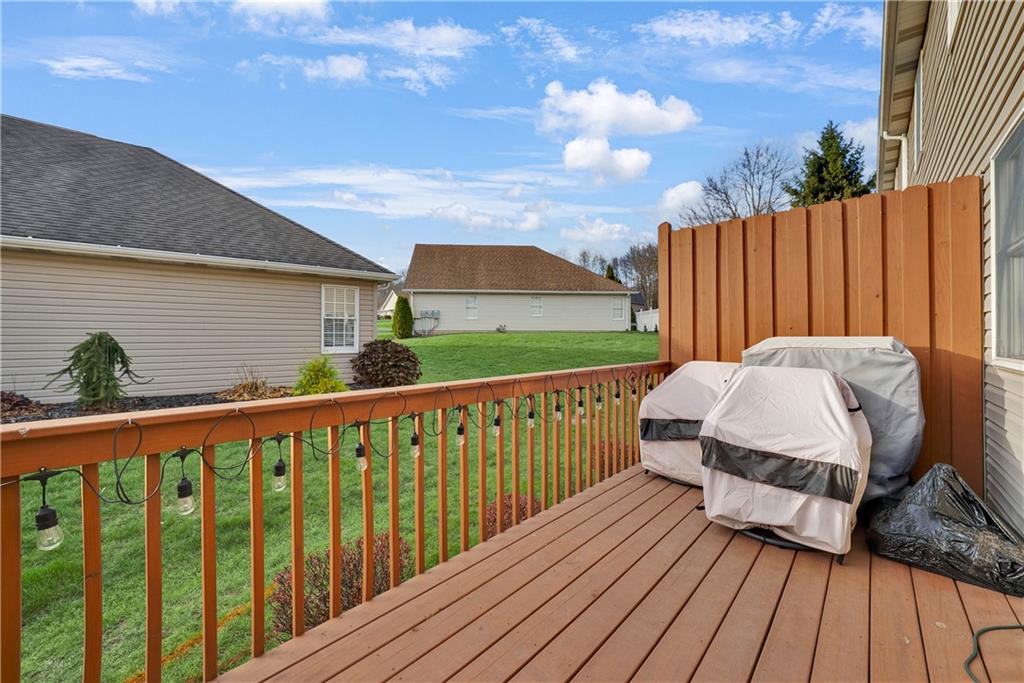 306 Acre Avenue Butler, PA 16001 - Photo 28 of 29 a view of a roof deck with wooden floor and fence