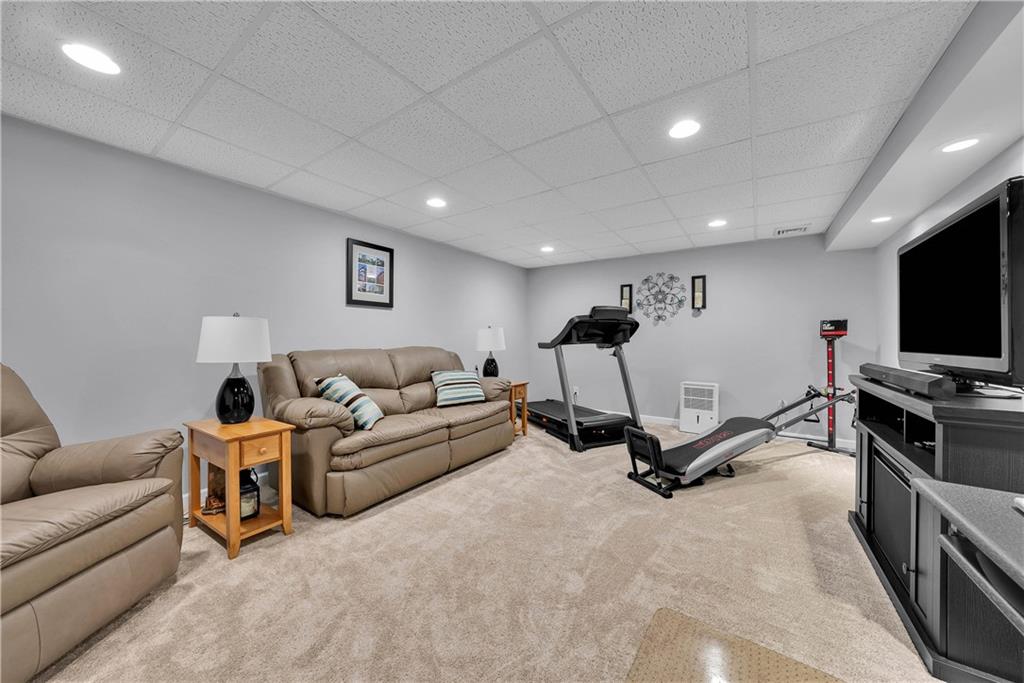 306 Acre Avenue Butler, PA 16001 - Photo 3 of 29 a living room with furniture and a flat screen tv