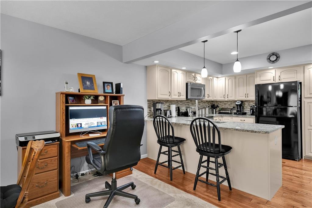 306 Acre Avenue Butler, PA 16001 - Photo 10 of 29 a view of a dining room with furniture window and wooden floor