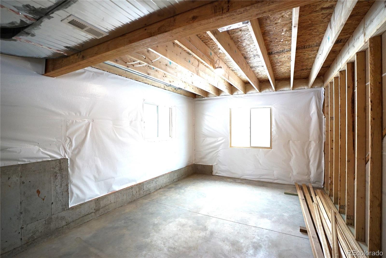 87 Neal Street Bailey, CO 80421 - Photo 12 of 15 a view of an empty room with windows