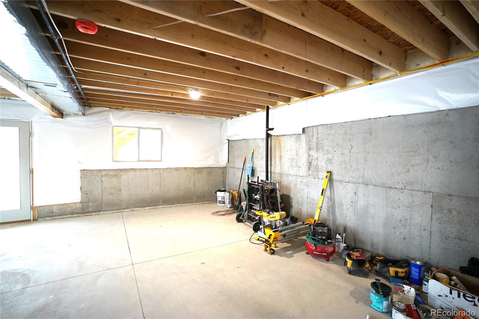 87 Neal Street Bailey, CO 80421 - Photo 14 of 15 a view of a room with gym equipment