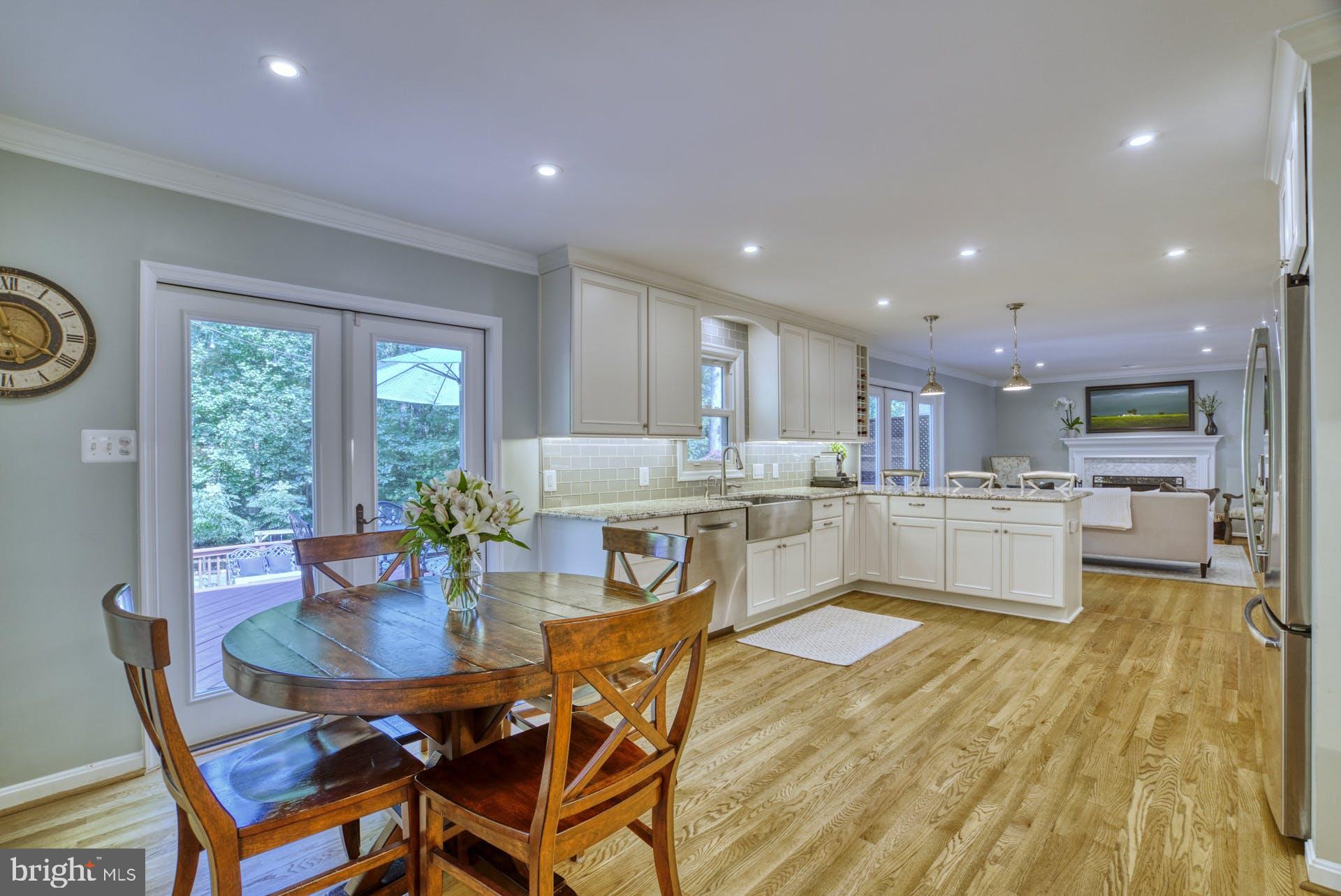 2643 Wild Cherry Place Reston, VA 20191 - Photo 18 of 53 Access to two tiered deck from Kitchen
