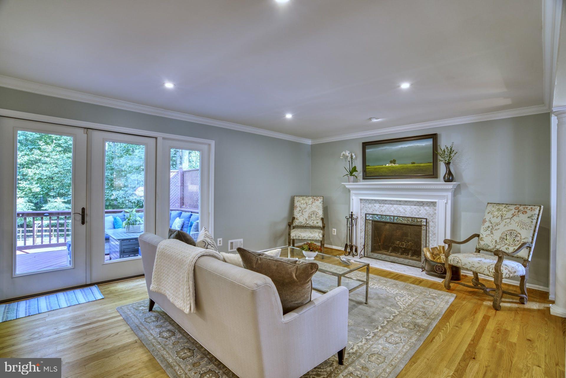 2643 Wild Cherry Place Reston, VA 20191 - Photo 8 of 53 Family Room with wood burning fireplace