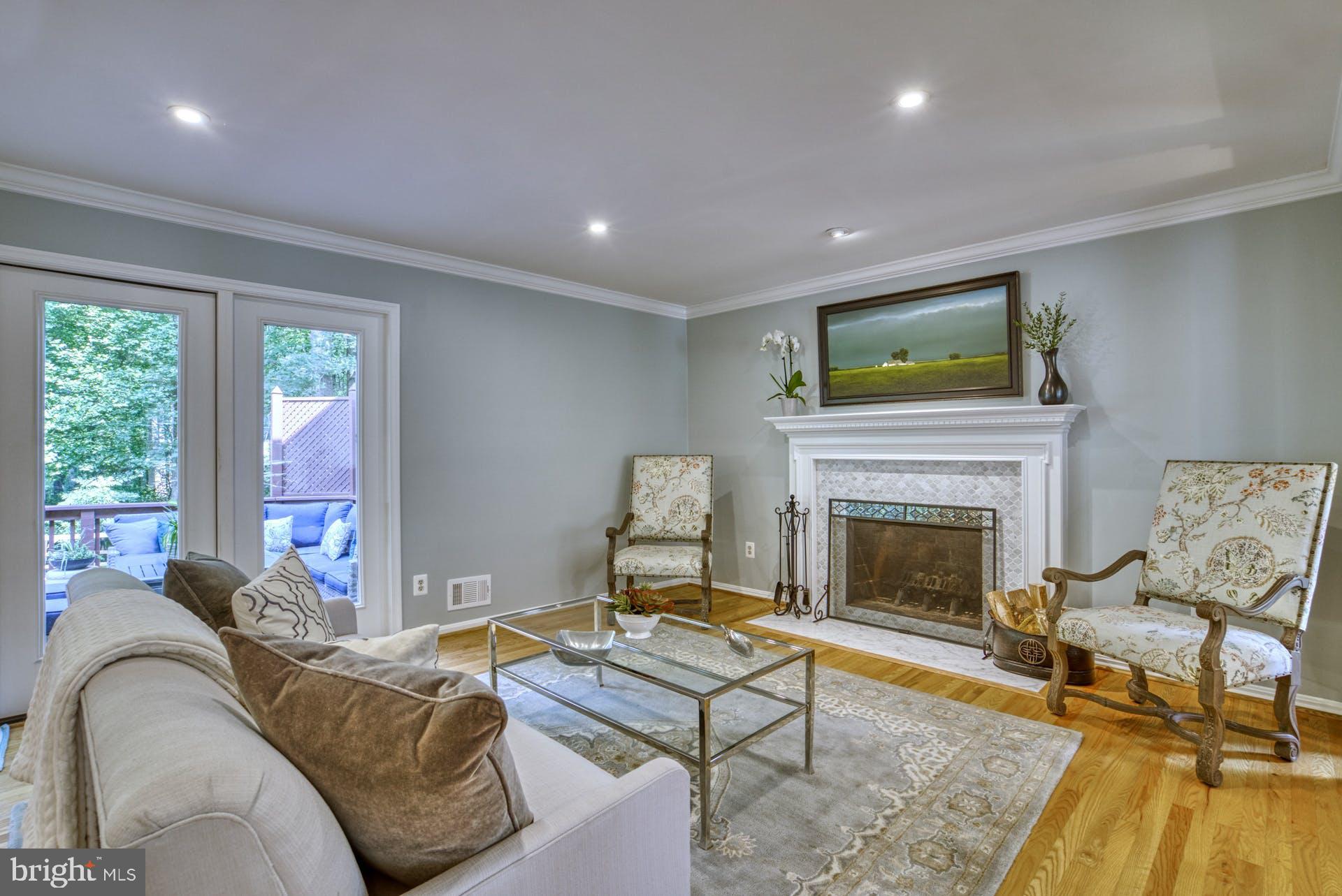 2643 Wild Cherry Place Reston, VA 20191 - Photo 9 of 53 Family room with french doors to deck