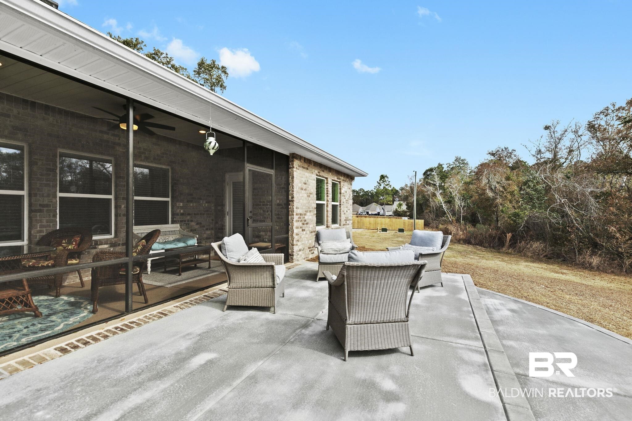 1141 Pencarro Boulevard Foley, AL 36535 - Photo 46 of 70 View of patio featuring outdoor lounge area and ceiling fan