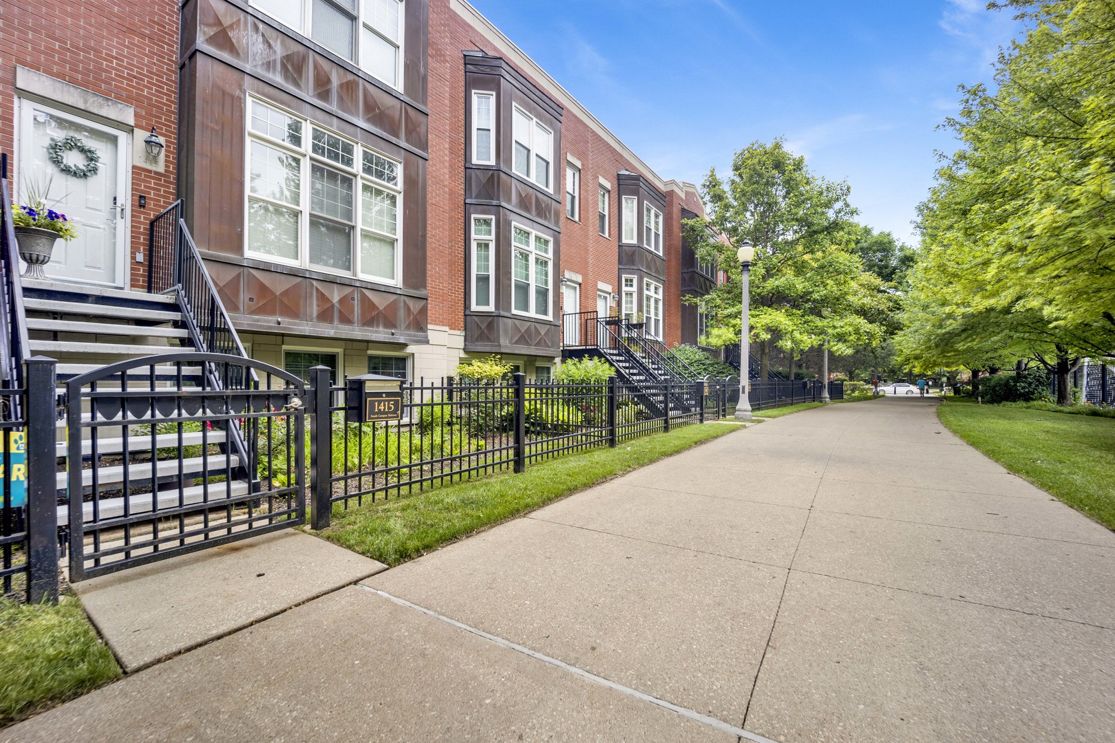 1414 South Halsted Street, Unit 3A Chicago, IL 60607 - Photo 34 of 62 a view of a brick building with a yard