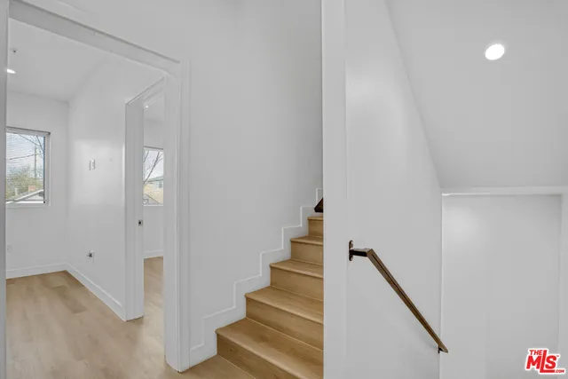 a view of entryway with stairs