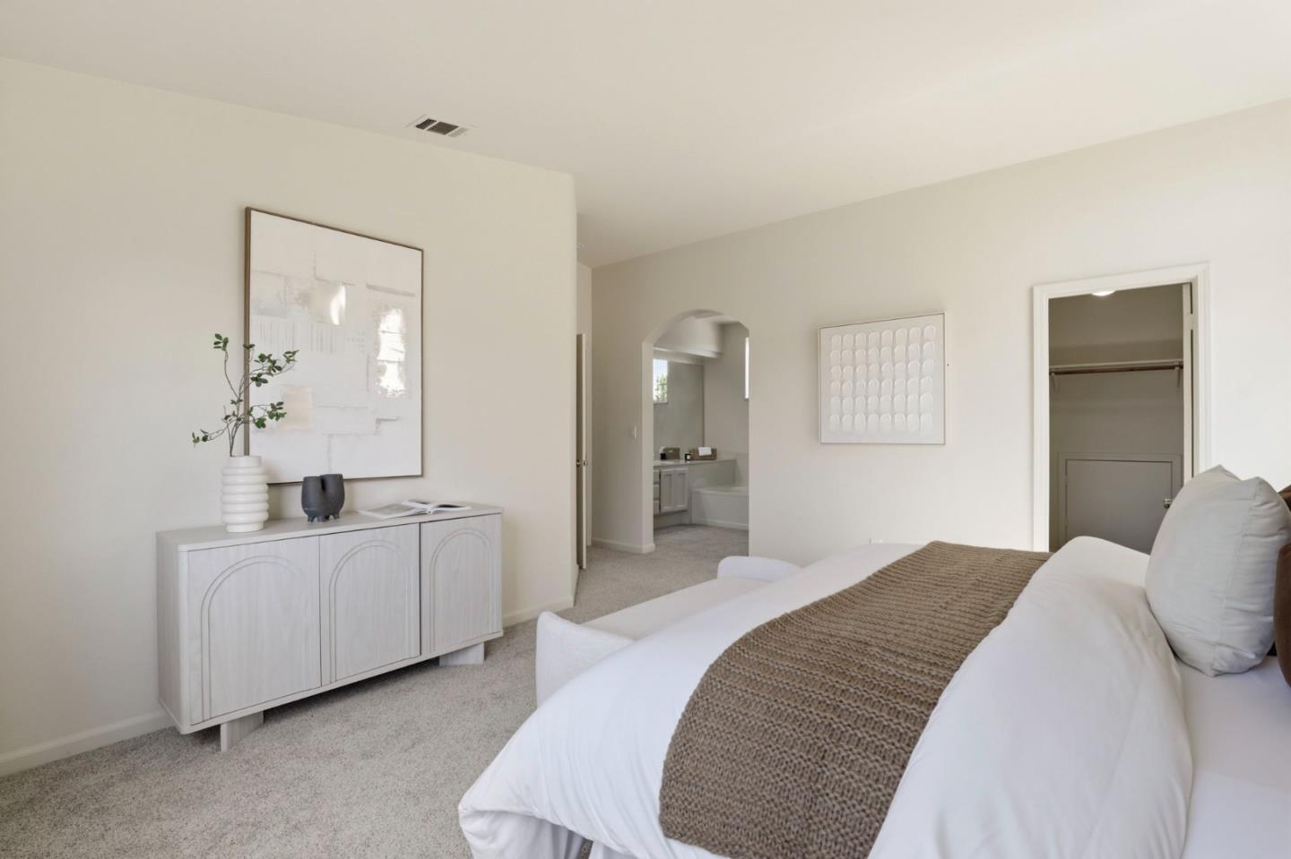 34237 Tupelo Street Fremont, CA 94555 - Photo 18 of 33 a bedroom with a bed a mirror and a dresser