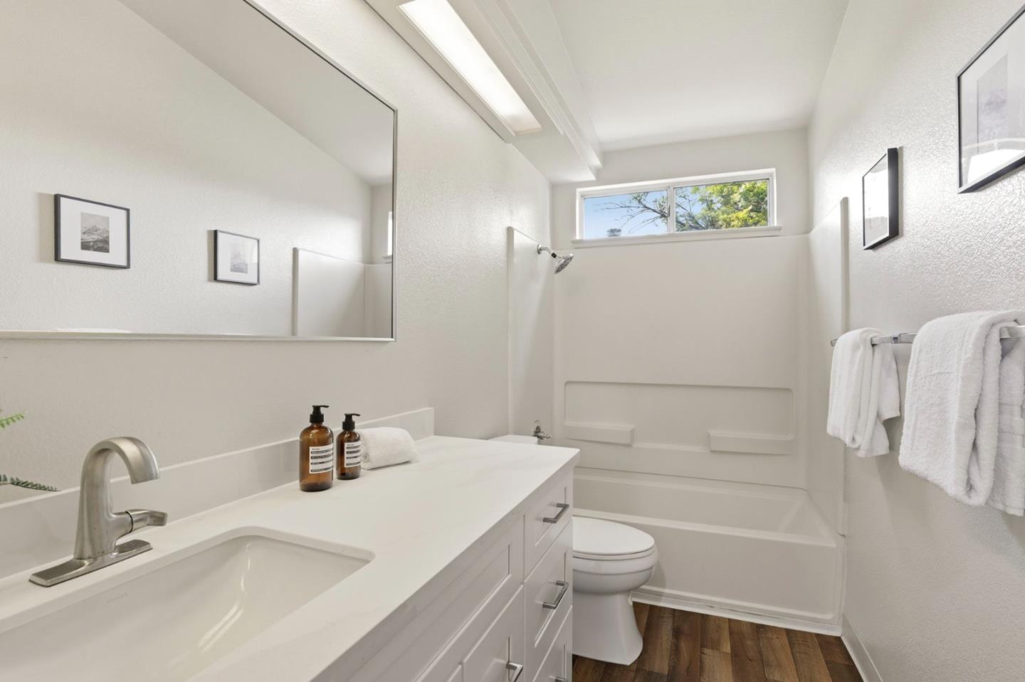 34237 Tupelo Street Fremont, CA 94555 - Photo 24 of 33 a bathroom with a sink toilet and shower